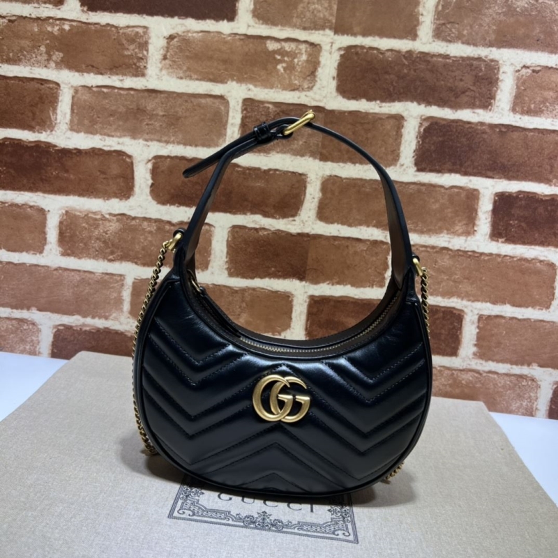 G*u*i top handle bags